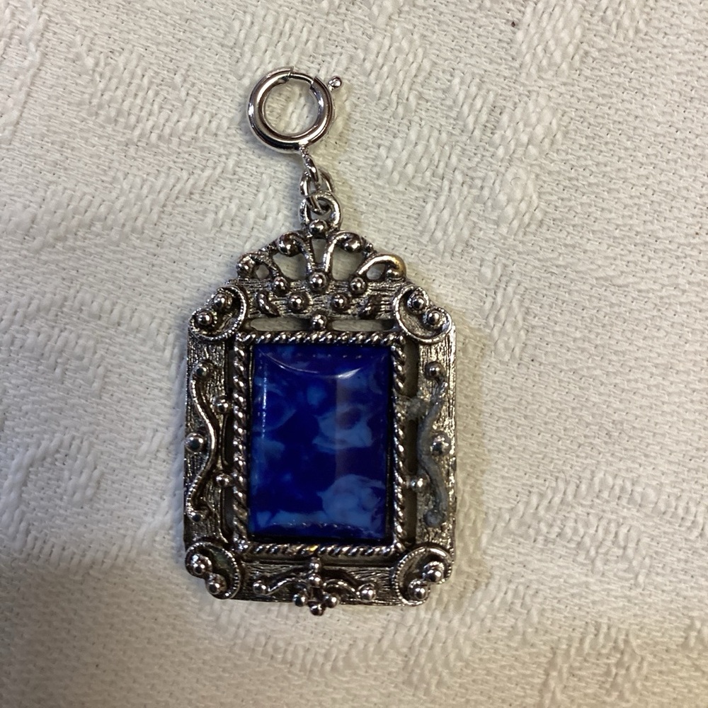 Vintage Sarah Coventry Roman Holiday reversible  faux blue lapis pendant charm